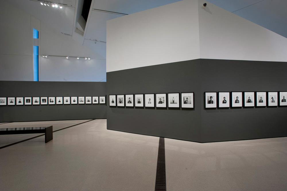 Installation view of “Observance and Memorial: Photographs from S-21, Cambodia” at the Royal Ontario Museum's Institute for Contemporary Culture