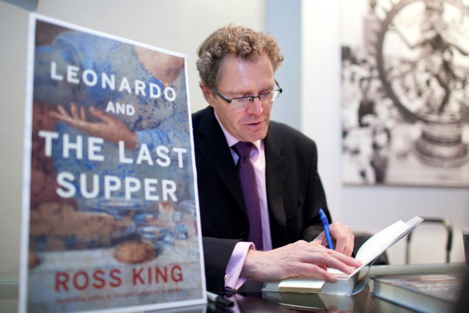 Ross King at signs books at a fall 2012 Canadian Art Foundation International Speaker Series event