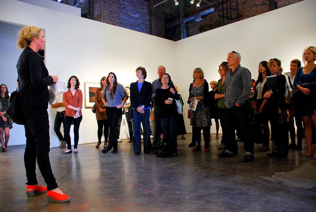 Curator Melanie O'Brian talks at Monte Clark Gallery Toronto during the 2011 Gallery Hop / photo Mariam Nader