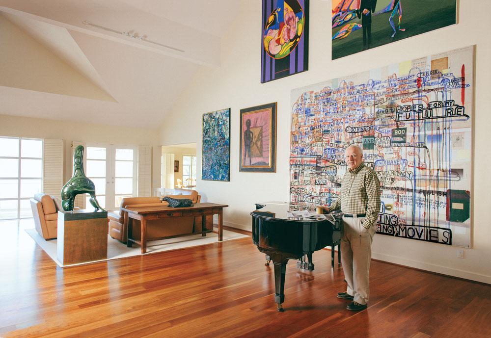 Patron and collector Michael Audain at his Vancouver home with works from his private collection, including (bottom right) Graham Gillmore’s <em>PLOY</em> (2003), January 2013 / photo Hubert Kang