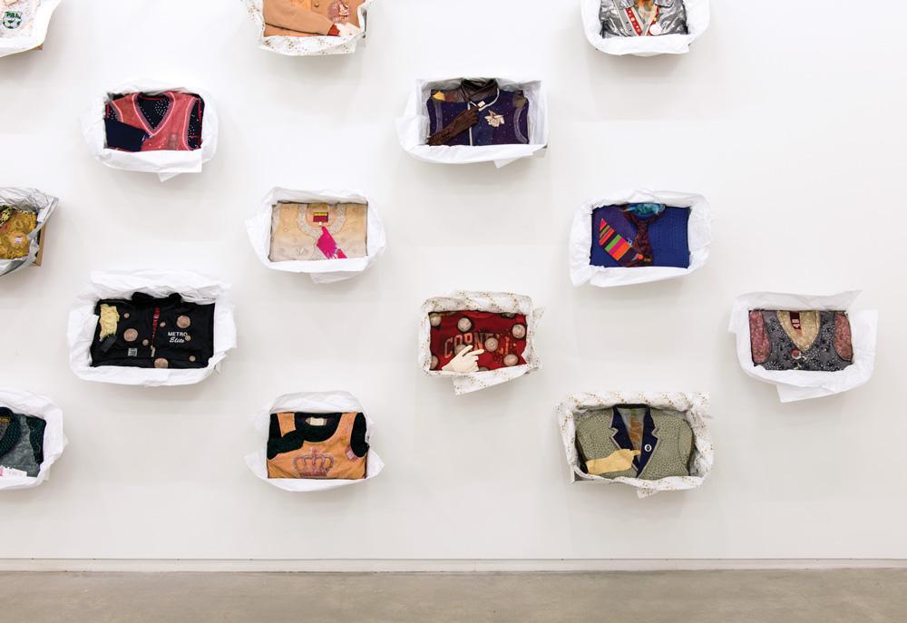 Liz Magor <em>Being This</em> 2012 Installation view 36 boxes, papaer, textile and found materials, 30.5 x 48.2 x 6.3cm each (approx.); overall dimensions variable / photo Scott Massey