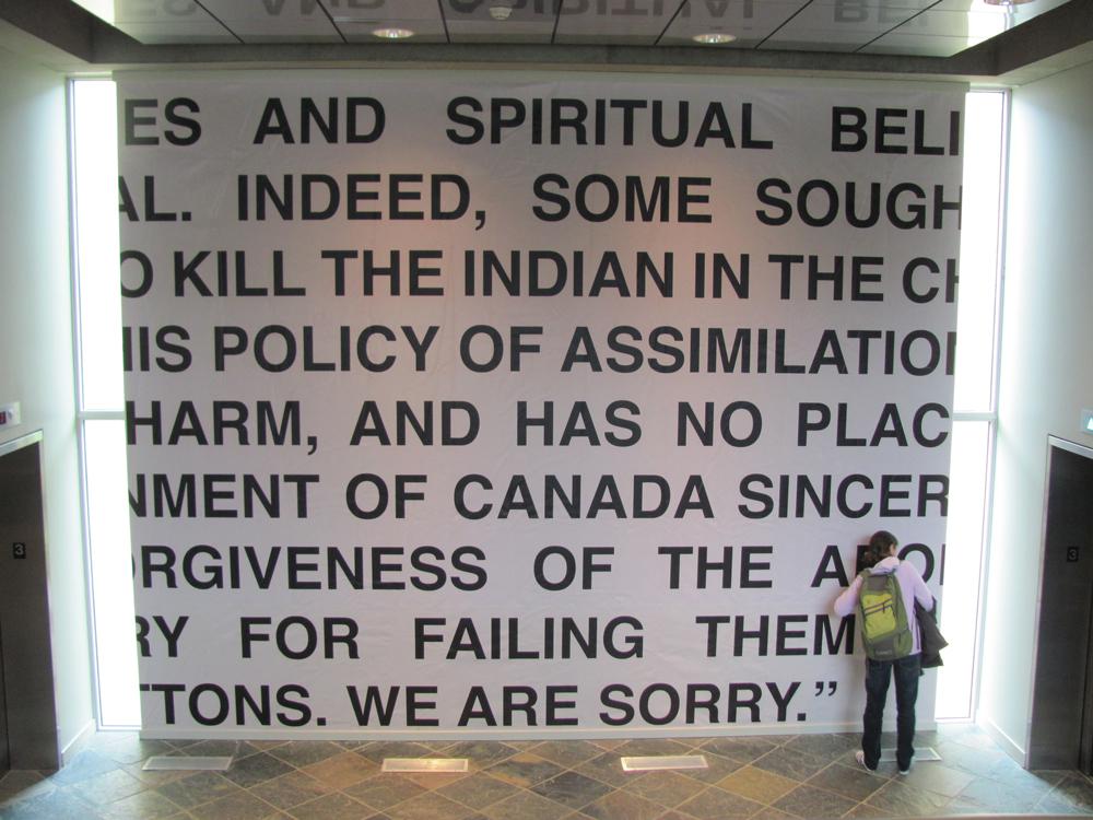 Cathy Busby <em>WE ARE SORRY 2013</em> 2013  Installation view at UBC Walter C. Koerner Library Vinyl billboard Courtesy the artist / photo Michael R. Barrick