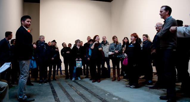 A crowd gathers for a free 2013 Vancouver Gallery Hop talk.