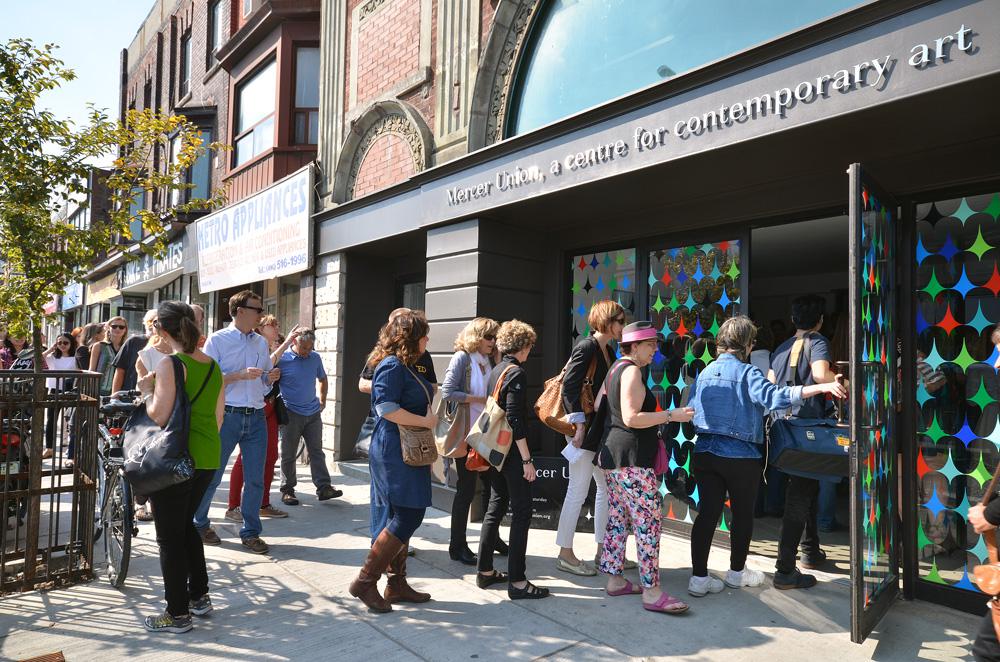 Crowds of art lovers enjoy a tour at the 2014 Toronto Gallery Hop. Photo: Nicola Betts
