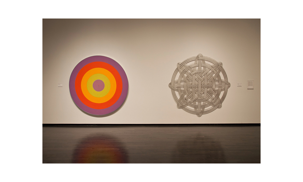 From left: Claude Tousignant, <em>Gong 80</em>, 1966; Judith Schwarz, <em>Shutter</em>, 2001. Installation at the Art Gallery of Alberta. Photo: Charles Cousins.