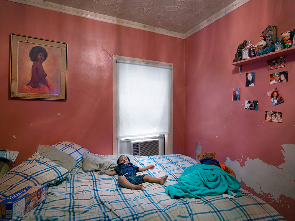 Dave Jordano, <em>Semira Sleeping in Kat's House, Eastside, Detroit</em>, 2012.