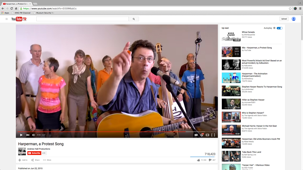 Screenshot of Tony Turner and the Crowd of Well Wishers performing <em>Harperman, a Protest Song</em>.