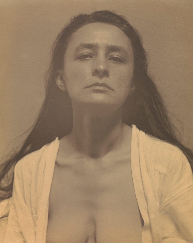 Georgia O’Keeffe as photographed by Alfred Steiglitz in 1918. In letters to Steiglitz, O'Keeffe described many of her travels, including ones to Canada. Courtesy  J. Paul Getty Museum, Los Angeles
© The J. Paul Getty Trust.