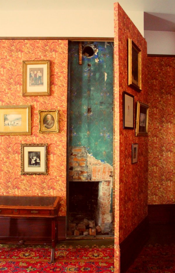A secret fireplace is hidden behind a carefully decorated wall at the Spadina House Museum in Toronto. Photo: Twitter.