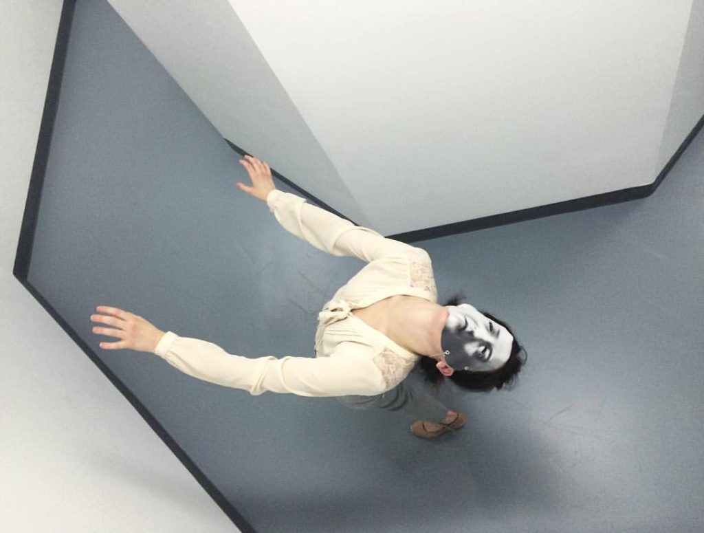 Sarah Anne Johnson performs in <em>Hospital Hallway</em> at Division Gallery in Toronto. Photo: Stephen Bulger Gallery Facebook Page.