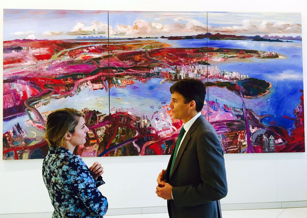 Canadian Heritage Minister Mélanie Joly, seen here with a painting by John Hartman and in discussion with Vancouver Mayor Gregor Robertson, is known as a fan of the arts, and is a former board member of the Musée d'art contemporain in Montréal. So some are wondering why many arts genres were excluded from Canadian Heritage's new Expert Advisory Panel on Canadian Content in a Digital Age. Photo: Facebook.