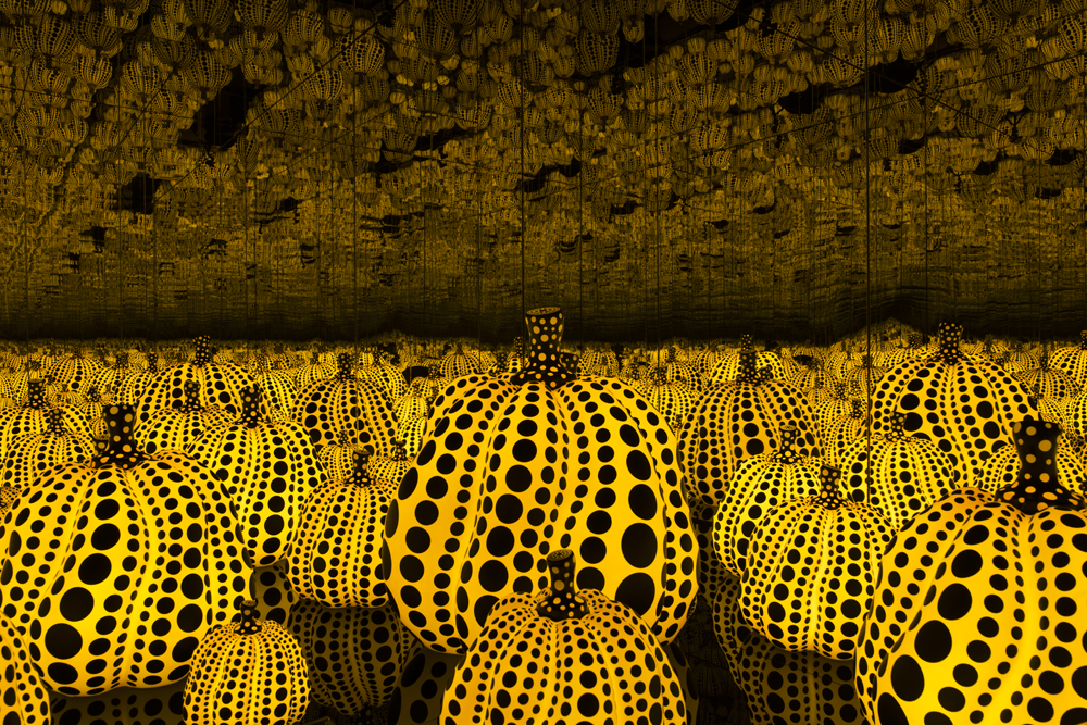 Yayoi Kusama, <em>All the Eternal Love I Have for the Pumpkins</em>, 2016. Wood, mirror, plastic, black glass, LED. Collection of the artist. Courtesy Ota Fine Arts, Tokyo / Singapore and Victoria Miro, London. © Yayoi Kusama.