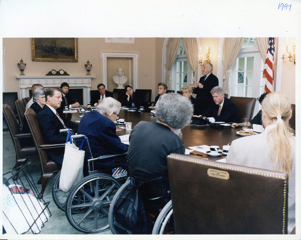 Photograph of Disability Movement Activists with President Bill Clinton and Vice-President Al Gore 