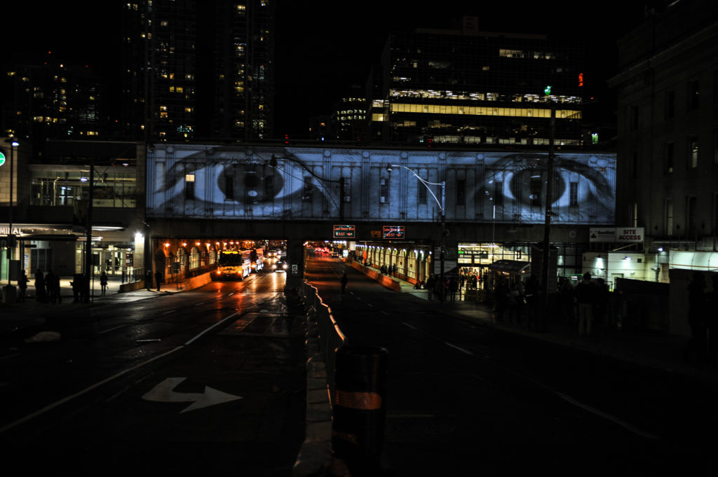 JR's projections onto city structures were a highlight of Nuit Blanche 2015. What will be the top works this year? Photo: City of Toronto.