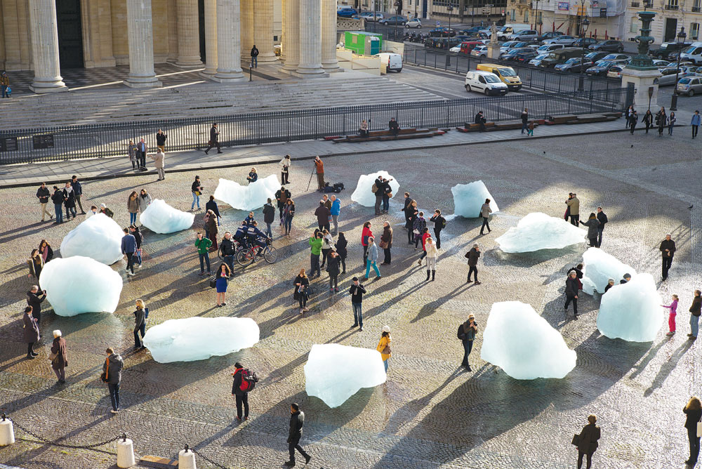 Olafur Eliasson, <i>Ice Watch</i>, 2014. Twelve ice blocks. Installation view at Place 
du Panthéon, Paris. Photo: Martin Argyroglo.
