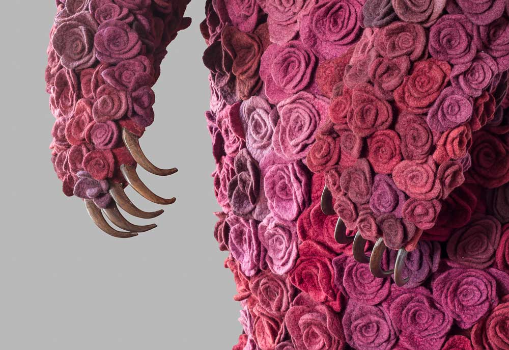 Janice Wright Cheney, <em>Widow</em> (detail), 2012. Wool, cochineal dye, velvet, taxidermy form, pins and wood, 239 cm x 91.5 cm x 76 cm. Collection of Glenbow Museum. Photo: Jeff Crawford.