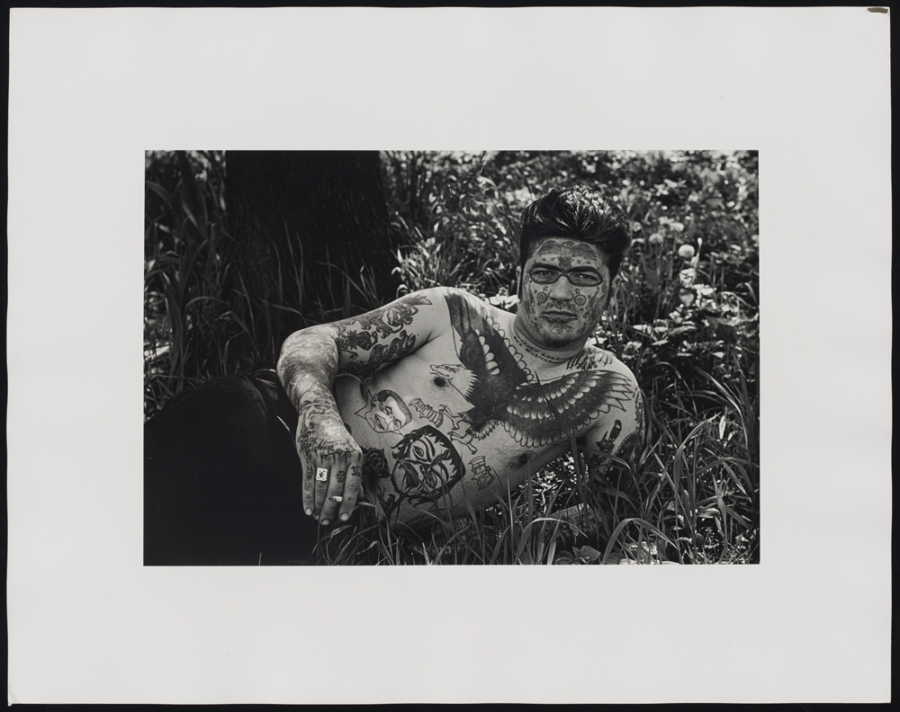 Diane Arbus, <em>Jack Dracula lying by a tree, N.Y.C.</em>, 1961. Gelatin silver print. Collection of the Art Gallery of Ontario, gift of Phil Lind, 2016. Copyright the Estate of Diane Arbus, LLC.