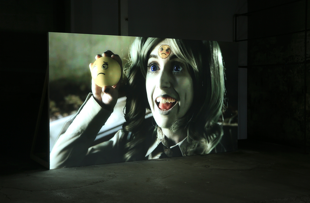 Installation view of Rachel Maclean's <em>Feed Me!</em>, 2015. HD Video, 60 min.