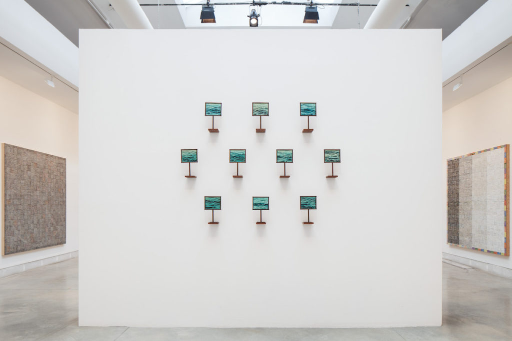 Visitors to the Venice Biennale are welcome to step up on specially made stools to view some of the works in Hajra Waheed's installation. Photo: Francesco Galli. Courtesy: La Biennale di Venezia.