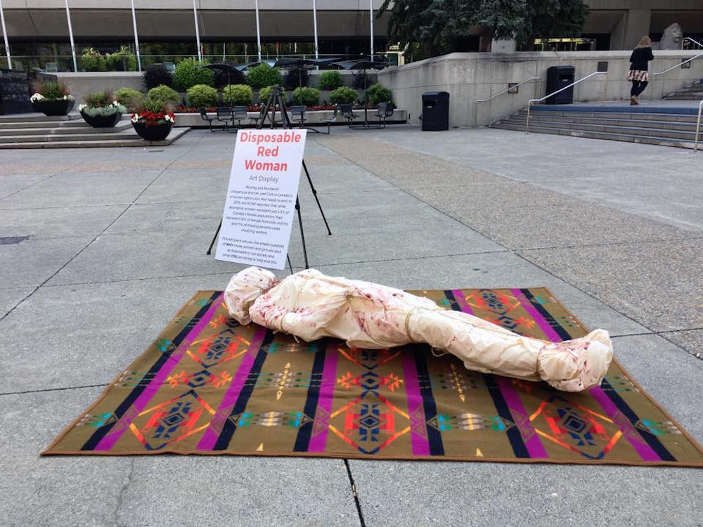 The Disposable Red Woman display outside of Calgary's City Hall. The project is intended to call attention to the plight of missing and murdered Indigenous women. Photo: Courtesy the Canadian Cutural Mosaic Foundation.