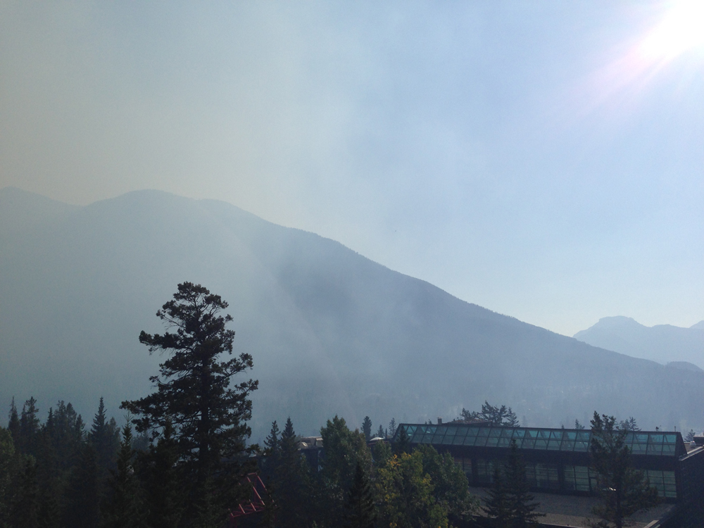 Smoke from BC forest fires blows into Banff township, obscuring the park's famed mountains, in late July 2017. Photo: Leah Sandals.
