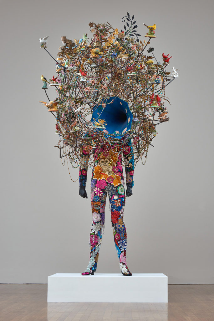 Nick Cave, <i>Soundsuit</i>, 2015. Mixed media including gramophone horn, ceramic birds, metal flowers, strung beads, fabric, metal and mannequin, 284.5 x 150 x 122 cm. Collection of the National Gallery of Canada. © Nick Cave. Courtesy of Jack Shainman Gallery, New York. Photo: NGC.