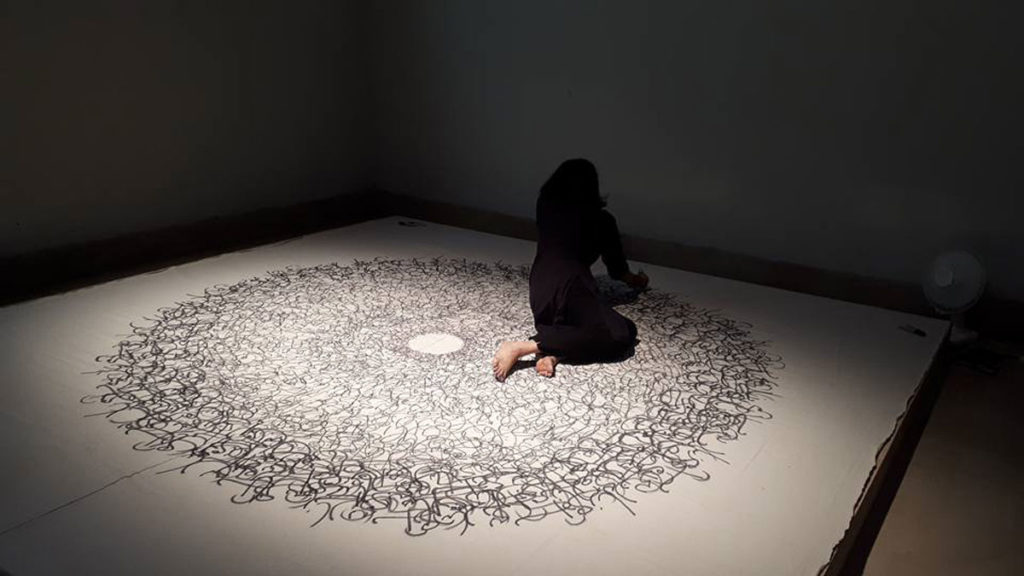 Tazeen Qayyum, <em>
 Unvoiced </em>, 2017. Durational drawing performance at NJV School, Karachi Biennale 2017, 2 hrs approx. Courtesy Tazeen Qayyum.


