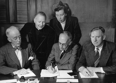 Members of the Massey Commission on National Development in the Arts, Letters, and Sciences in 1951. Seated from left: Montreal engineer Arthur Surveyor, committee chair and University of Toronto chancellor Vincent Massey, and UBC president Norman Mackenzie. Standing: Laval University's Georges Henri Levesque and University of Saskatchewan history professor Hilda Neatby. Courtesy University of Toronto Archives.