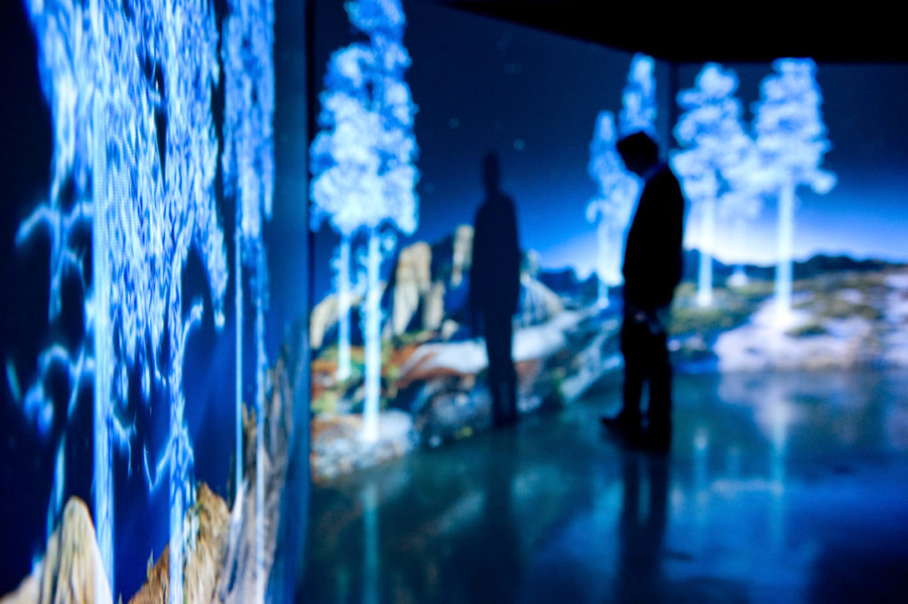 Kelly Richardson, <em>The Erudition</em>, 2010. Installation view at NGCA UK. Three screens, HD video with sound, 20 min loop, 14.6 x 2.7 m. Courtesy the artist/Birch Contemporary. Photo: Colin Davison.