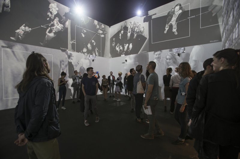 Rafael Lozano-Hemmer (in collaboration with Krzysztof Wodiczko), <em>Zoom Pavilion</em>, 2015. Shown here: Art Basel Unlimited - Art Basel 47, Bâle, Switzerland . Projectors, 9x infrared cameras, 3x robotic zoom cameras, 3x computers, 2x IR illuminators, 1x ethernet switch, HDMI and USB extenders and cables 
© Rafael Lozano-Hemmer / SODRAC 2018. Photo: Antimodular Research.