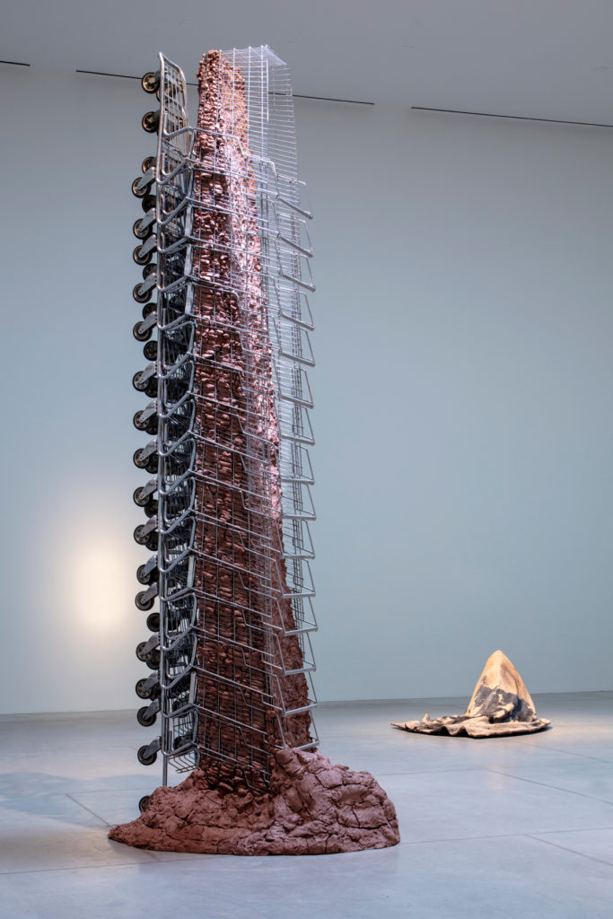 Rebecca Belmore, <em>Tower</em>, 2018. Clay and shopping carts. Installed at the Art Gallery of Ontario. © Rebecca Belmore.