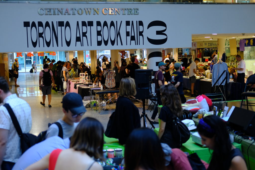 View of Toronto Art Book Fair at Chinatown Centre Mall. Photo: Milena Chevillard