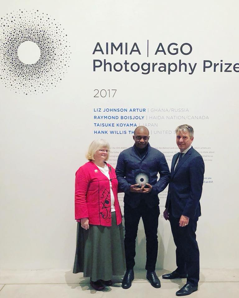 2017 AIMIA | AGO Photography Prize Winner Hank Willis Thomas (middle) with Aimia Curator and Director, Community Engagement Alden Hadwen (left) and the AGO’s CEO and Michael and Sonja Koerner Director Stephan Jost (right).‬ Photo: Facebook. 