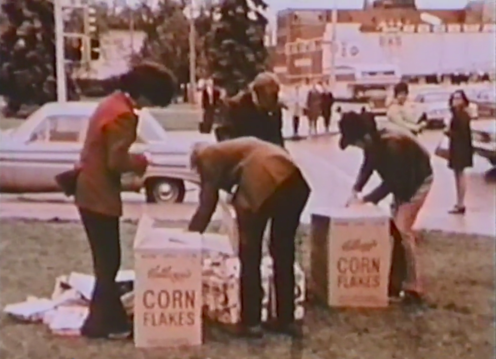 Still from <em>Place and Process, 1969</em>, showing Les Levine's <em>Cornflakes</em>, 30:01mins, Robert Fiore, Evander Schley and Willoughby Sharp (Great Balls of Fire Inc., New York), produced in conjunction with the exhibition of the same name at the Edmonton Art Gallery, September 24–October 26, 1969. Courtesy the Art Gallery of Alberta.