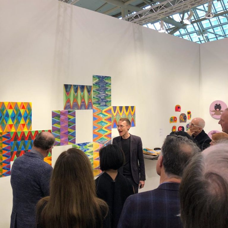An Oakville Galleries curator leads an Art Toronto tour to the watercolours and felt work of Charlene Vickers at the Fazakas Gallery booth. Photo: Instagram / @fazakasgallery.