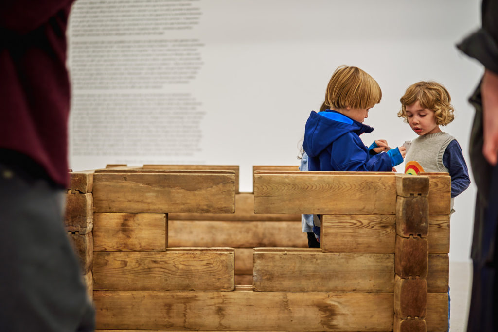 Children covene in Leisure’s installation <em>Panning for Gold/Walking You Through It</em> (2017) at Musée d’art de Joliette. The interactive sculptural piece is based on pieces of playground equipment that landscape architect Cornelia Hahn Oberlander designed for Expo 67. Photo: Romain Guilbault.