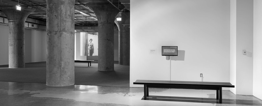 Chantal Akerman, <em>In the Mirror</em>, 2007. 16mm black-and-white film transferred to digital format, 14 min 21 sec. Installation view at MOCA Toronto. Photo: Tom Arban Photography Inc.