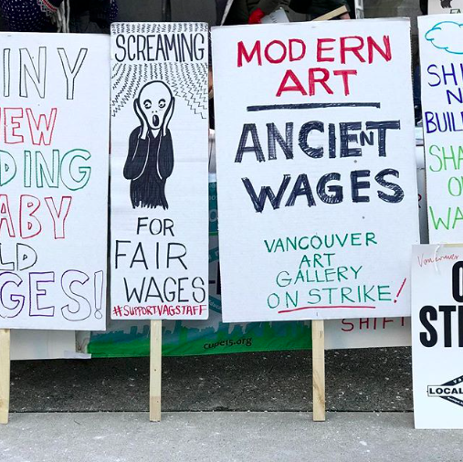 Picket signs at the Vancouver Art Gallery this week. Photo: Instagram / @vagonstrike. 