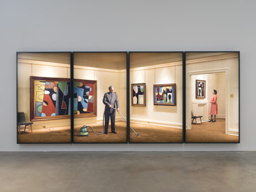 Rodney Graham, <em>Vacuuming the Gallery, 1949</em>, 2018. Four painted aluminum lightboxes with transmounted chromogenic transparencies, 304 x 748 x 18 cm overall. Edition of 3. 
