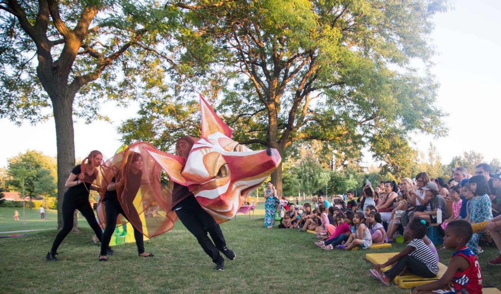 The Toronto Arts Council, which recently received a funding boost, helps support an arts program in local parks, among other projects. This image is from a 2016 Arts in the Parks project with Clay and Paper Theatre titled <em>Fables for the Future</em>. Photo: Tamara Romanchuk via Toronto Arts Council Facebook page.