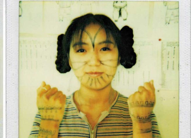 Tunnilik Arnaq Tattooed Woman by Pitaloosie Saila  Native Canadian Arts