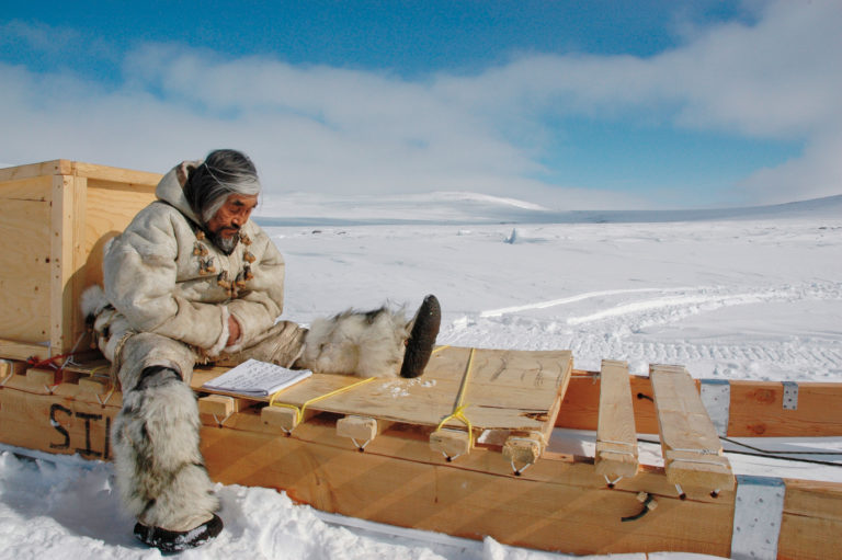 Abraham Ulayuruluk on the set of <em>The Journals of Knud Rasmussen</em>. Directed by Zacharias Kunuk and Norman Cohn. 2006. Film, 112 min. Courtesy Isuma Distribution International.