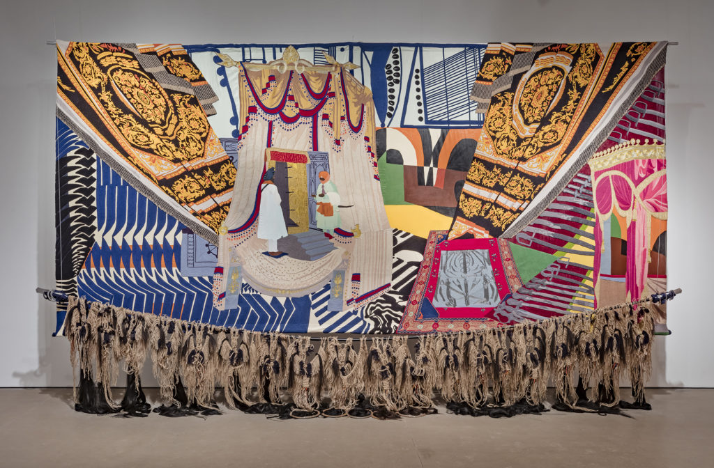 Nep Sidhu, <em>Medicine for a Nightmare</em> (from the series <em>When My Drums Come Knocking, They Watch</em>), 2019. Cotton, wool, jute, zari, hair, steel, 559 x 274 cm. Commissioned by
Mercer Union. Photo: Toni Hafkenscheid. Courtesy the artist.