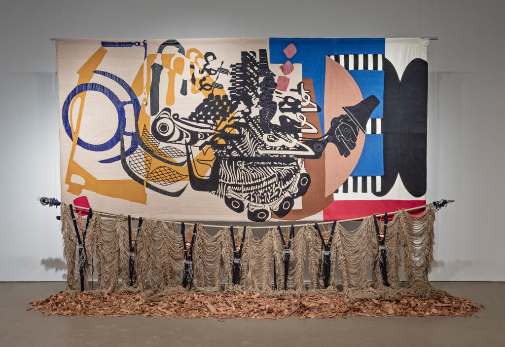 Nep Sidhu in collaboration with Nicholas Galanin, <em>Axes in Polyrhythm</em> (from the series <em>When
My Drums Come Knocking, They Watch</em>), 2018. Cotton wool, jute, copper leaf, resin, nylon, red cedar, 488 x 274 cm. Photo: Toni Hafkenscheid. Courtesy the artist.