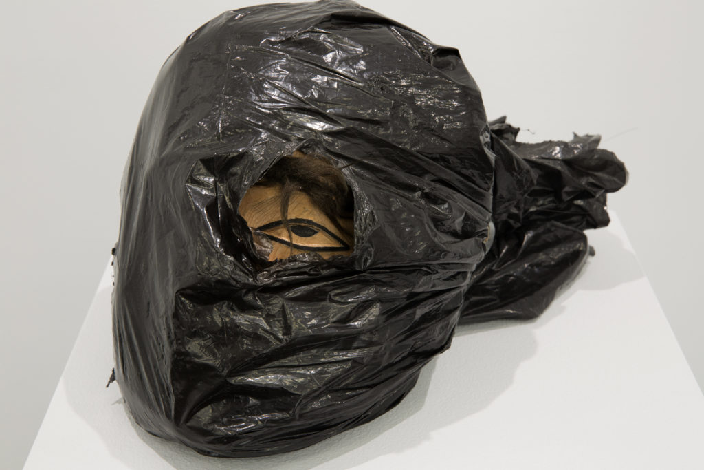 Beau Dick, <em>Towkwit Head</em>, 2016.
Western red cedar, plastic garbage bag,
acrylic. Collection Joe Friday and Grant Jameson. Courtesy White Columns. Photo: Marc Tatti 