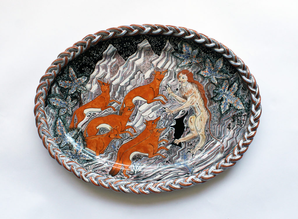 Lindsay Montgomery, <em>Lioness Charger</em>, 2016. Press-molded and tin-glazed earthenware, painted with stains and underglazes, 63 cm across. Photo: Lindsay Montgomery.
