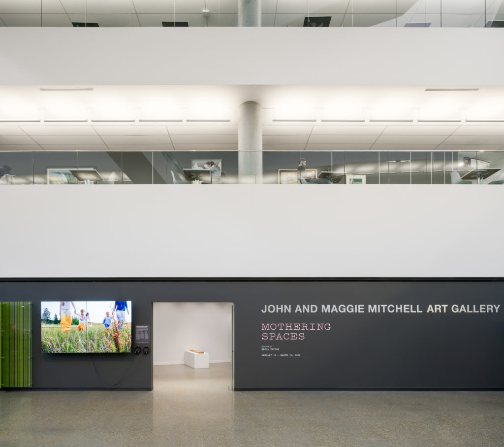 The exterior of the Mitchell Art Gallery during “Mothering Spaces.” During the show, the video screen to the left of the gallery entrance featured the program “Indigenous Birthing,” curated by Ociciwan Contemporary Art Collective and offering art by The Ephemerals, Jules Koostachin and Rebeka Tabobondung. Photo: Blaine Campbell.