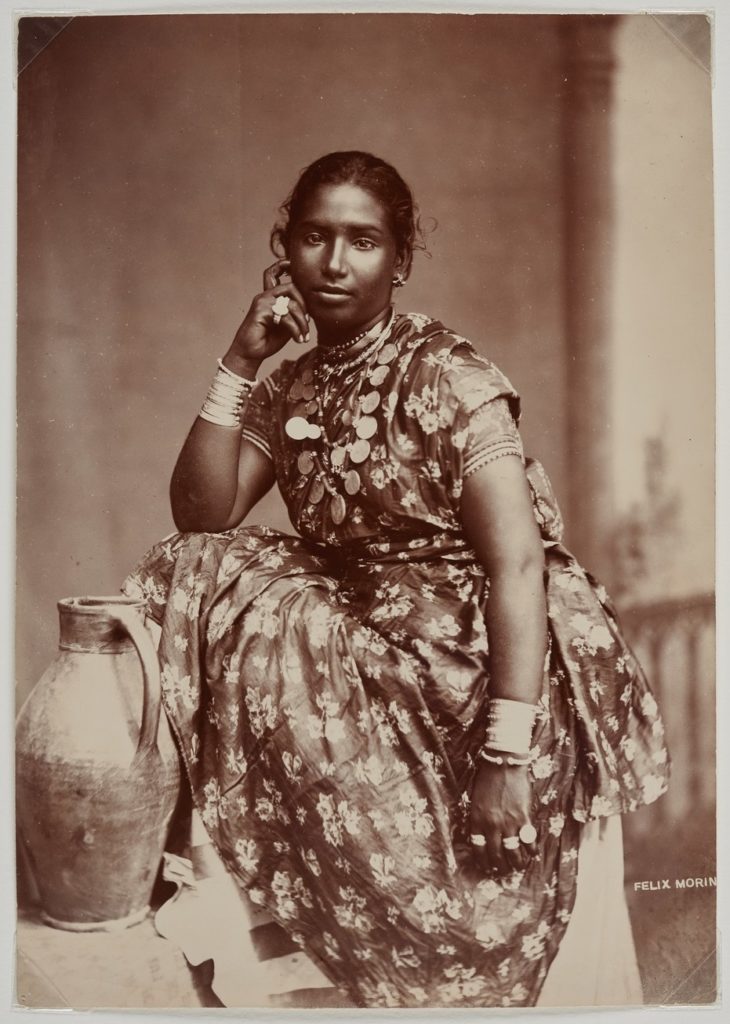 Felix Morin, <em>Coolie Woman, Trinidad</em>, c. 1890. Albumen print, 21.3 x 14.9 cm. Montogomery Collection of Caribbean Photographs. Donor funds to acquire the Montgomery Collection of Caribbean Photographs include the support of Dr. Liza and Dr. Frederick Murrell, Bruce Croxon and Debra Thier, Wes Hall and Kingsdale Advisors, Cindy and Shon Barnett, Donette Chin-Loy Chang, Kamala-Jean Gopie, Phil Lind and Ellen Roland, Martin Doc McKinney, Francilla Charles, Ray and Georgina Williams, Thaine and Bianca Carter, Charmaine Crooks, Nathaniel Crooks, Andrew Garrett and Dr. Belinda Longe, Neil L. Le Grand, Michael Lewis, Dr. Kenneth Montague and Sarah Aranha, Lenny and Julia Mortimore, and The Ferrotype Collective, 2019.