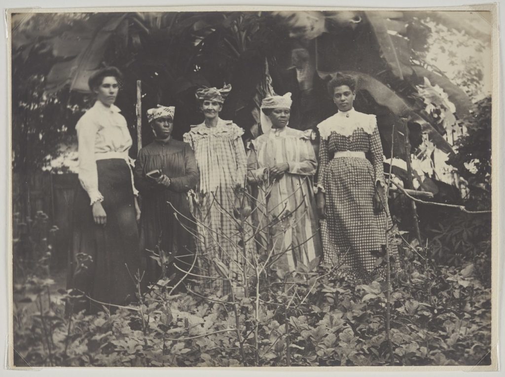 Unknown photographer, <em>Jamaican Women</em>, c. 1900. Gelatin silver print, 16.5 x 21.6 cm. Montogomery Collection of Caribbean Photographs. Donor funds to acquire the Montgomery Collection of Caribbean Photographs include the support of Dr. Liza and Dr. Frederick Murrell, Bruce Croxon and Debra Thier, Wes Hall and Kingsdale Advisors, Cindy and Shon Barnett, Donette Chin-Loy Chang, Kamala-Jean Gopie, Phil Lind and Ellen Roland, Martin Doc McKinney, Francilla Charles, Ray and Georgina Williams, Thaine and Bianca Carter, Charmaine Crooks, Nathaniel Crooks, Andrew Garrett and Dr. Belinda Longe, Neil L. Le Grand, Michael Lewis, Dr. Kenneth Montague and Sarah Aranha, Lenny and Julia Mortimore, and The Ferrotype Collective, 2019.