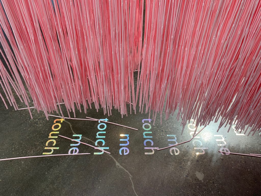 jes sachse, <em>Freedom Tube</em> (detail), 2019. Installation with straws, text and vinyl at the Small Arms Inspection Building. Courtesy the artist.